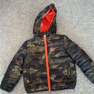 Nike camo/orange winter coat only worn a couple times. In perfect condition. 2t